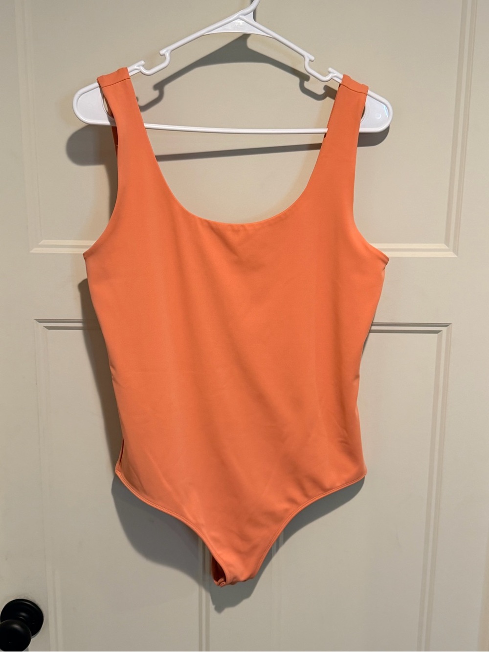 Express Bodysuit in Coral Orange - L